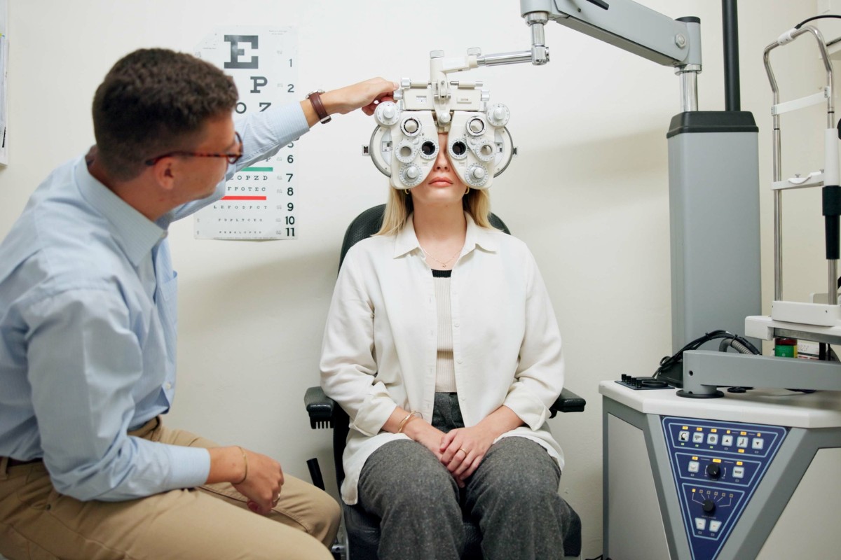 Optometrist performing comprehensive eye exam in Winnipeg – eye exam cost and eye test fees explained