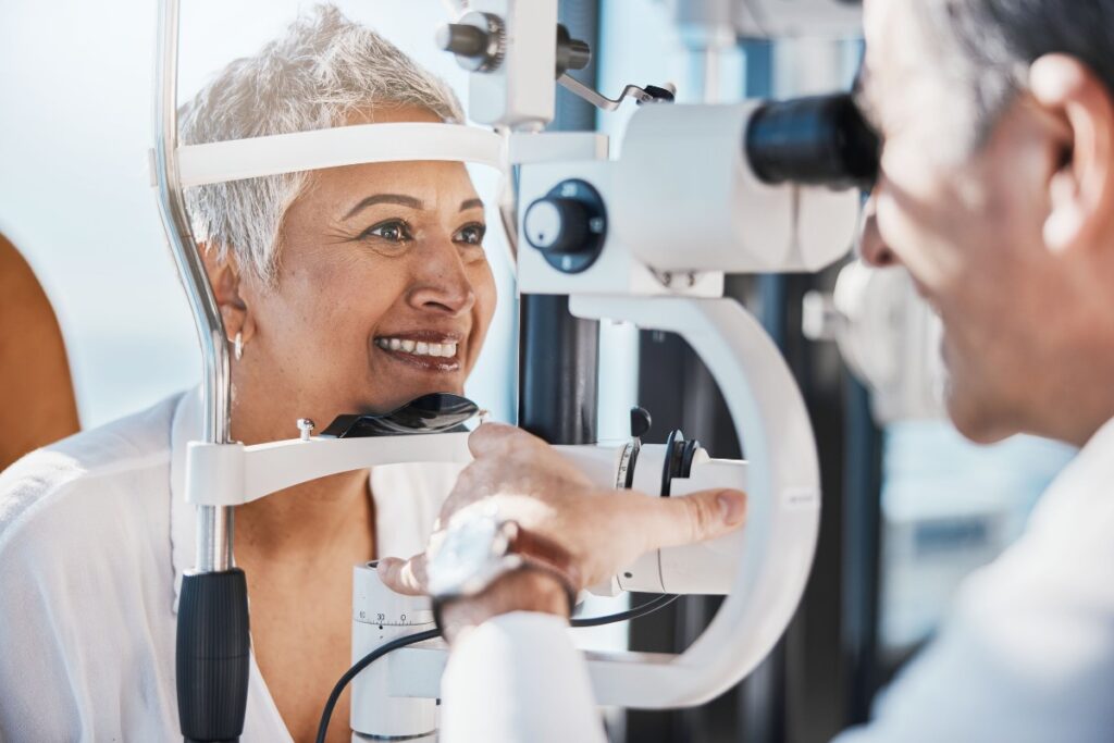 Senior patient having an eye exam in Winnipeg – additional $65 charges for eye test not covered by Manitoba Health